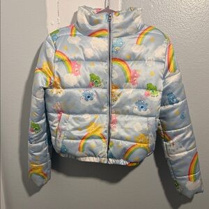 Dolls Kill Care Bear Pastel Puffer Jacket with Rainbow and Cloud Design